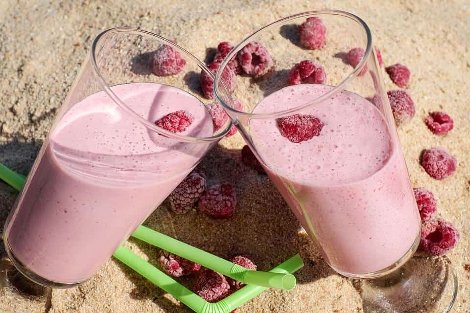 raspberry smoothie in glass cups